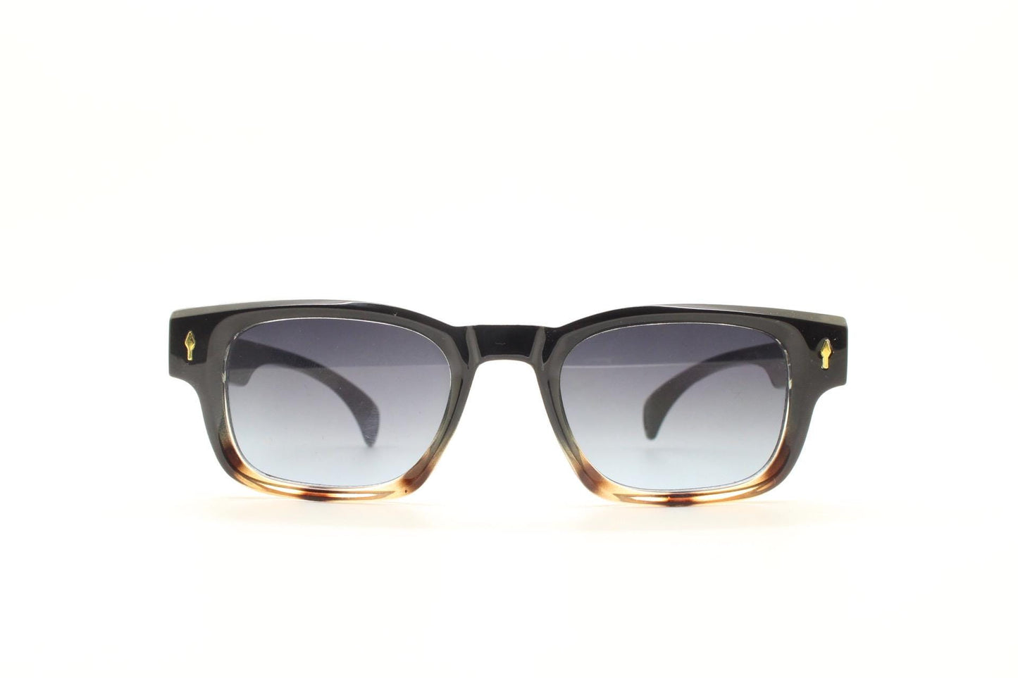 Vintage 90s low profile thick frame sunglasses. Black and tortoise ombre frame with graduating grey lenses. Unused NOS. One off sample