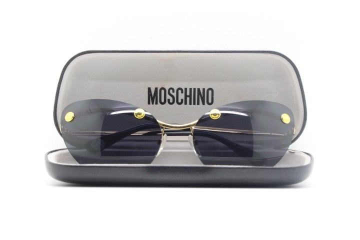 Moschino oval cat eye sunglasses model 082/S. Womens frameless cateye in perfect proportions with golden metal brow line
