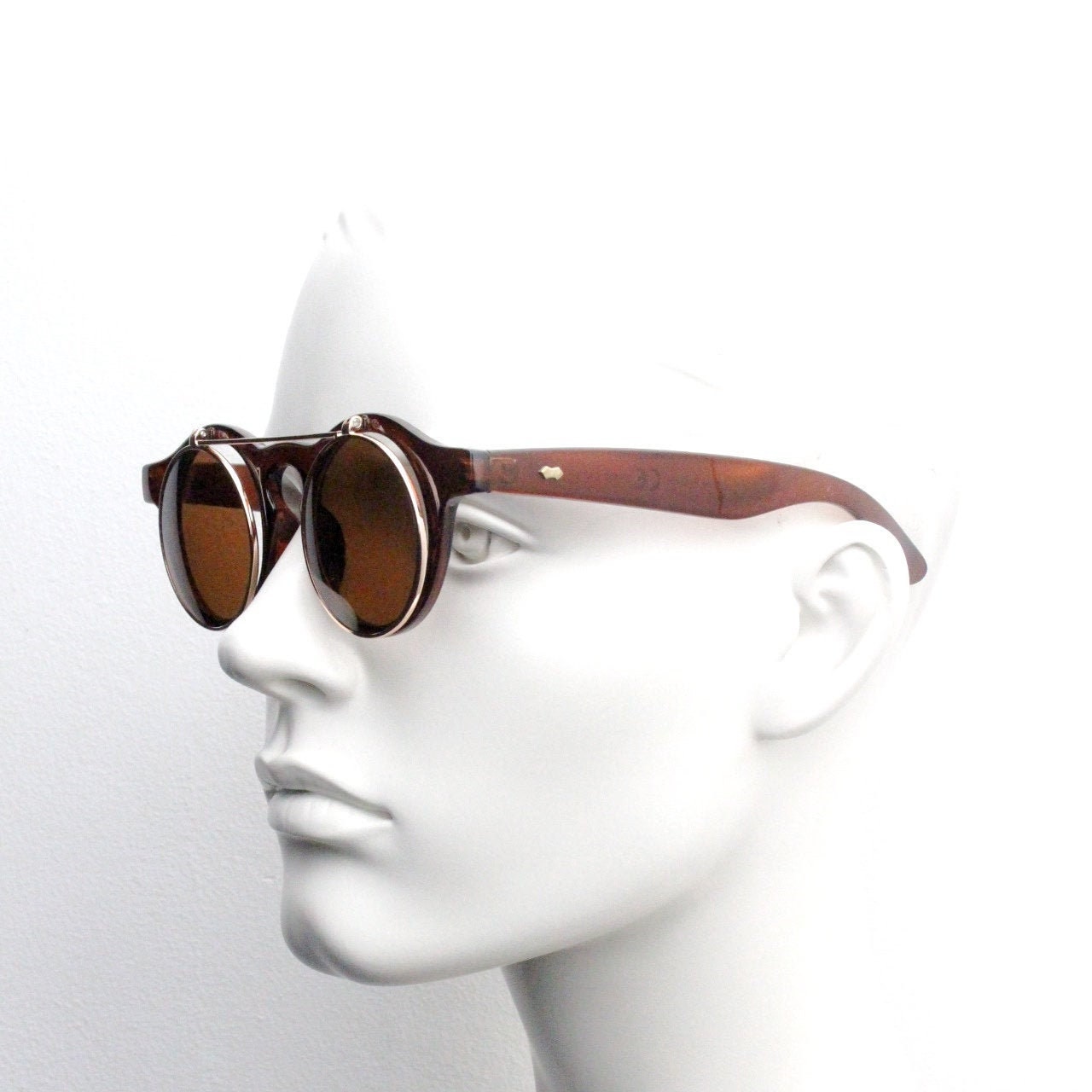 Vintage 90s round flipper sunglasses. 30s style brown frame with clear lenses and flip up sunglasses visor. BNWT unused