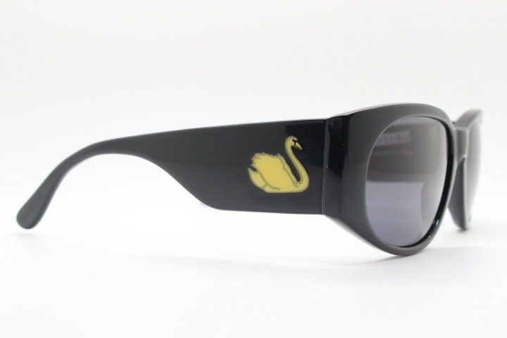 Charles Anastase for Linda Farrow Gallery sunglasses. Womens black gloss acetate  thick frame design with tall arms and swans. NOS vintage
