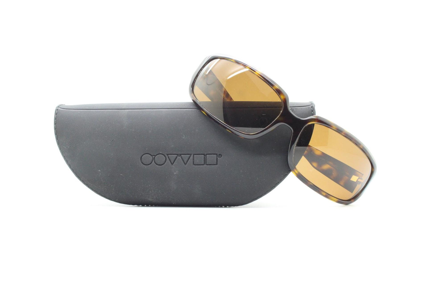 Oliver Peoples vintage Y2K wrap around sunglasses model Impala made in Japan. Curved bug eye in mottled brown tortoise acetate