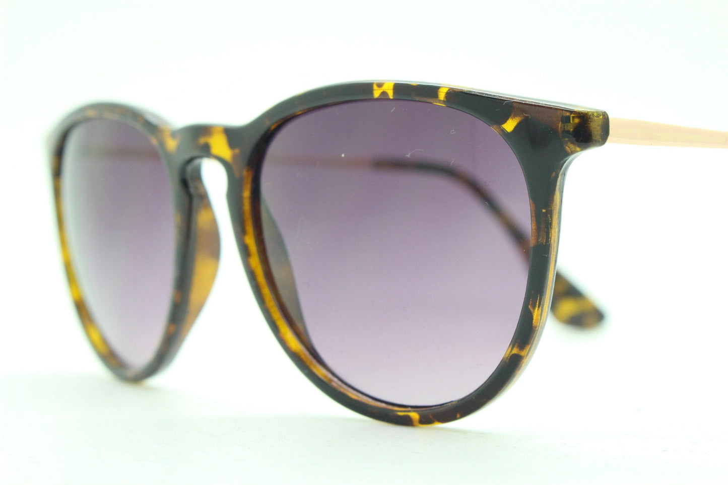 90s vintage sunglasses. Tortoise gloss frame with graduating black lenses and contrasting gold arms. Unused NOS