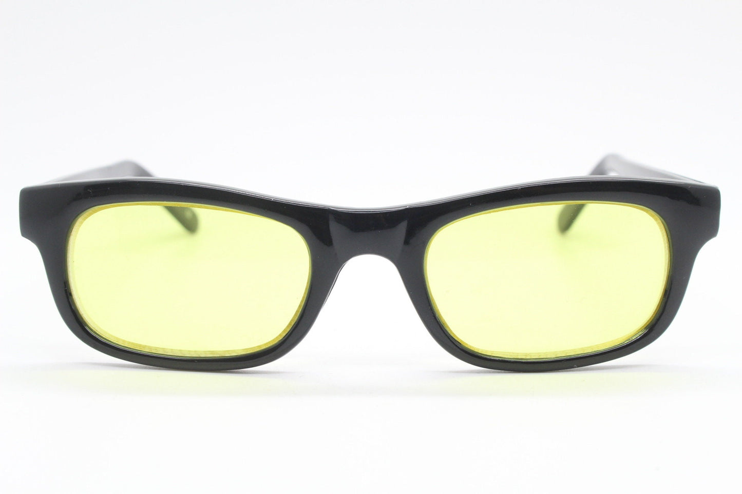 80s vintage rectangular sunglasses. Low profile slim black frame with psychedelic mod light tone canary yellow lenses. BNWT. NOS