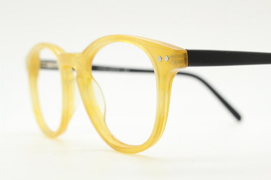 Entrostyle vintage round 40s design eye glasses. Beeswax coloured acetate optical frame with keyhole bridge and black arms. Prescription RX