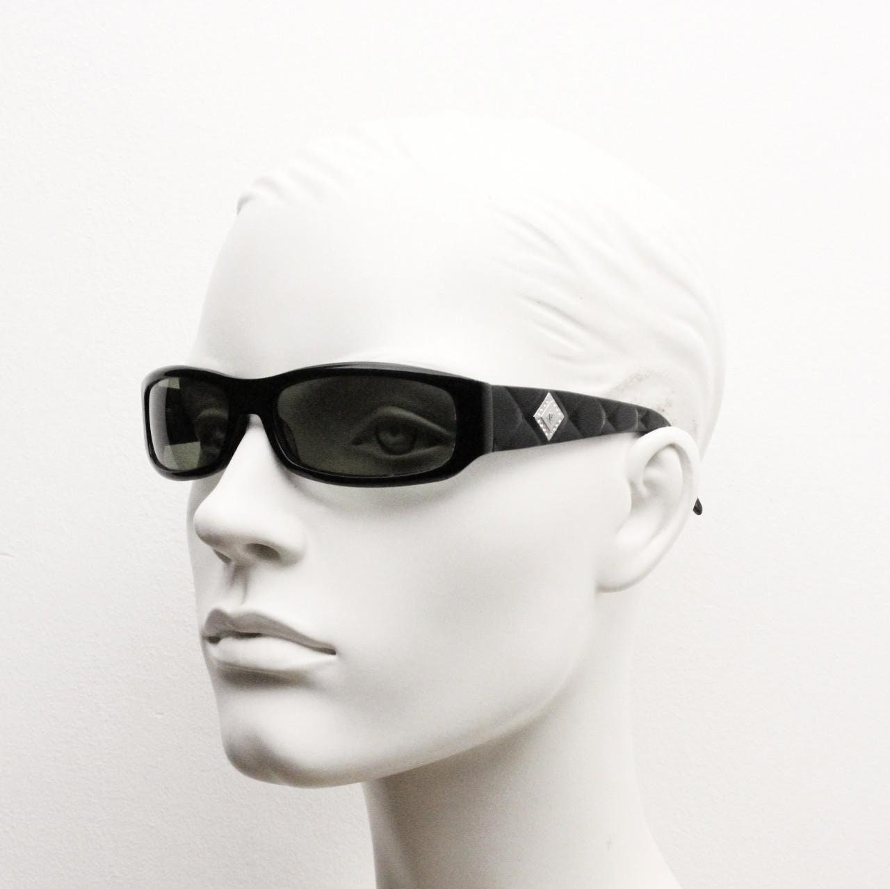 Pierre Cardin vintage 90s wrap around sunglasses made in Italy. Black acetate shield frame with quilted arms and diamante crest. NOS