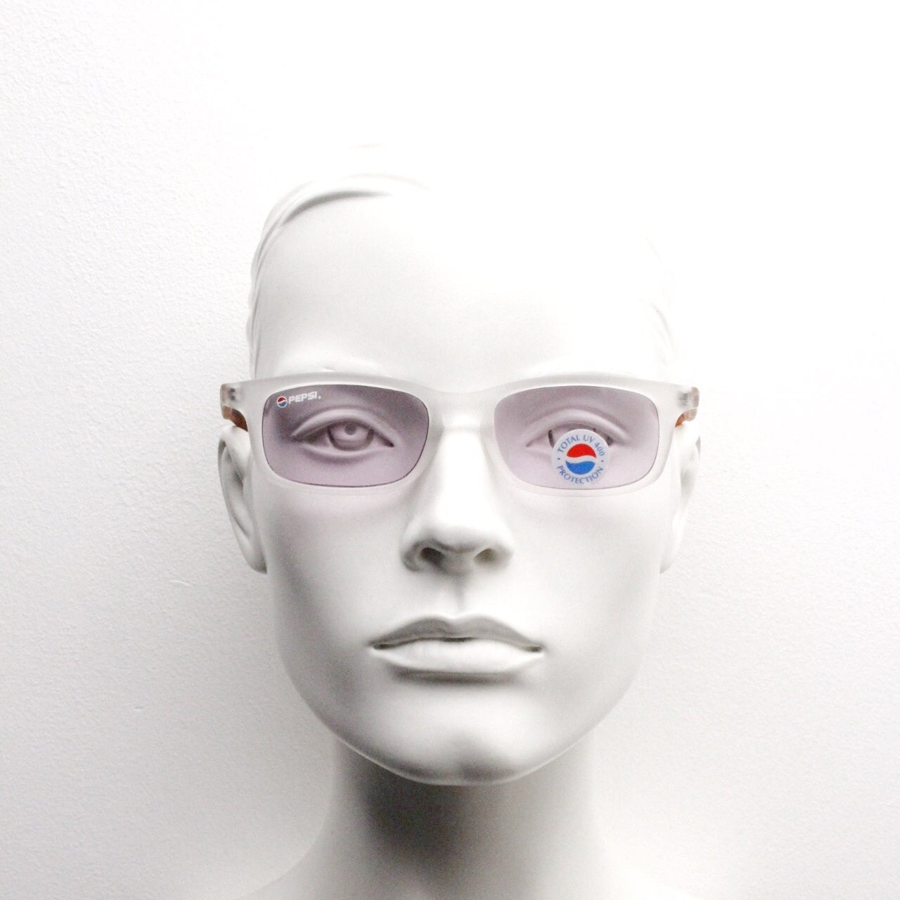 Pepsi 90s vintage sunglasses. Low profile rectangular frosted frame with tortoise arms and extra light tone purple lenses. Unused NOS