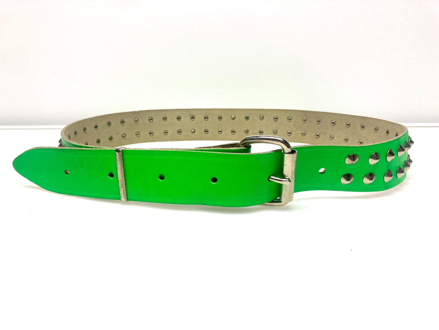 80s vintage thick genuine leather studded belt Made in the UK. Green dayglo with changeable buckle and 2 rows of conical metal studs. NOS M