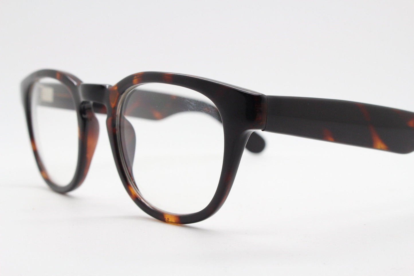 80s vintage modified wayfarer style glasses. Tortoise optical frames with keyhole bridge and clear lenses. 40s, 50s style NOS eyeglasses