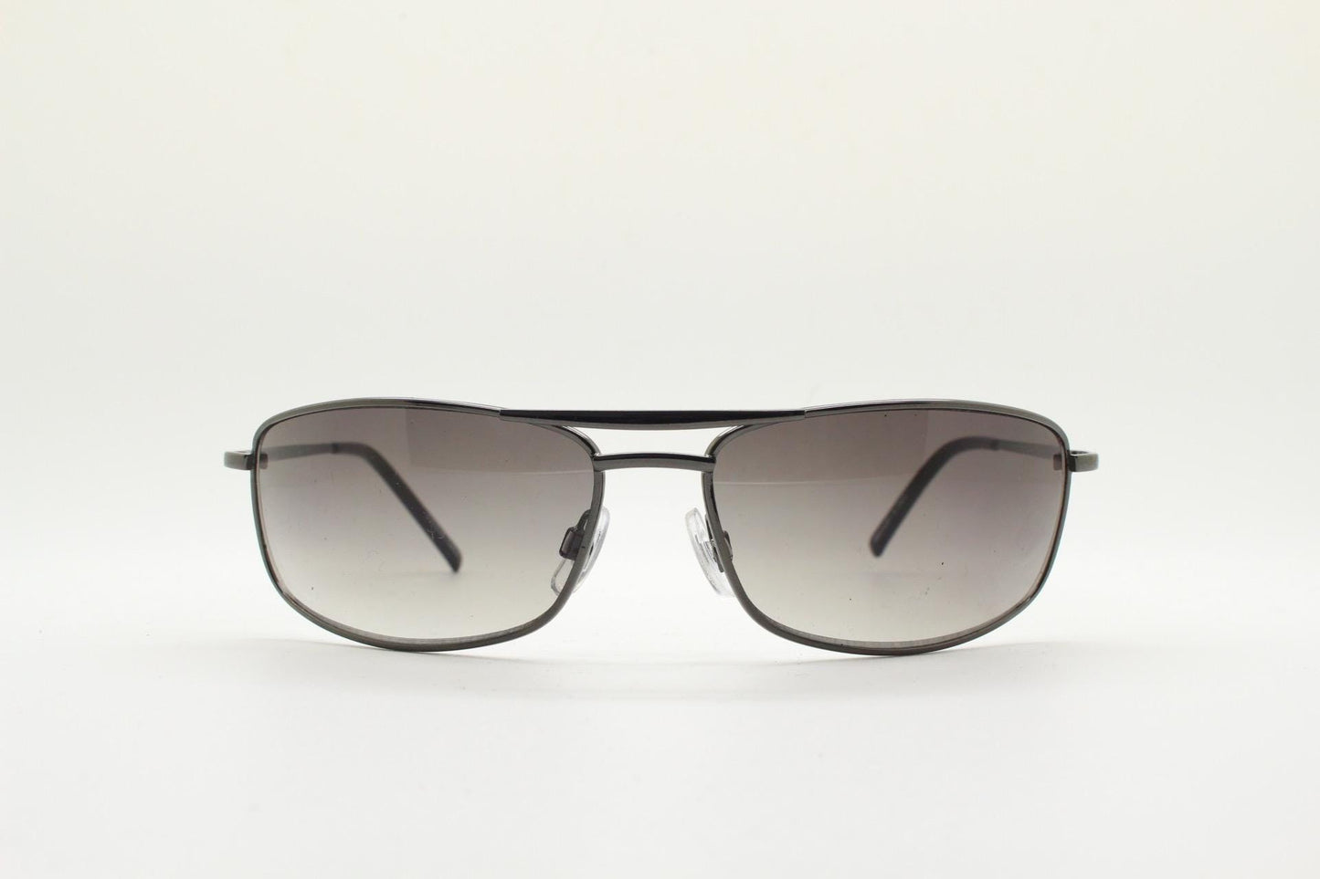 90s vintage rectangular wrap around sunglasses. Gunmetal chrome curved frame aviators with light tone gradient lenses. Unused NOS