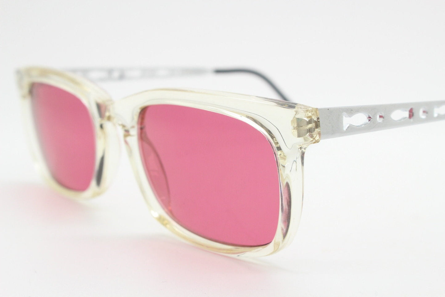 90s vintage futuristic crystal  sunglasses. Rectangular transparent frame with extraordinary arm cut outs and shocking pink lenses. NOS