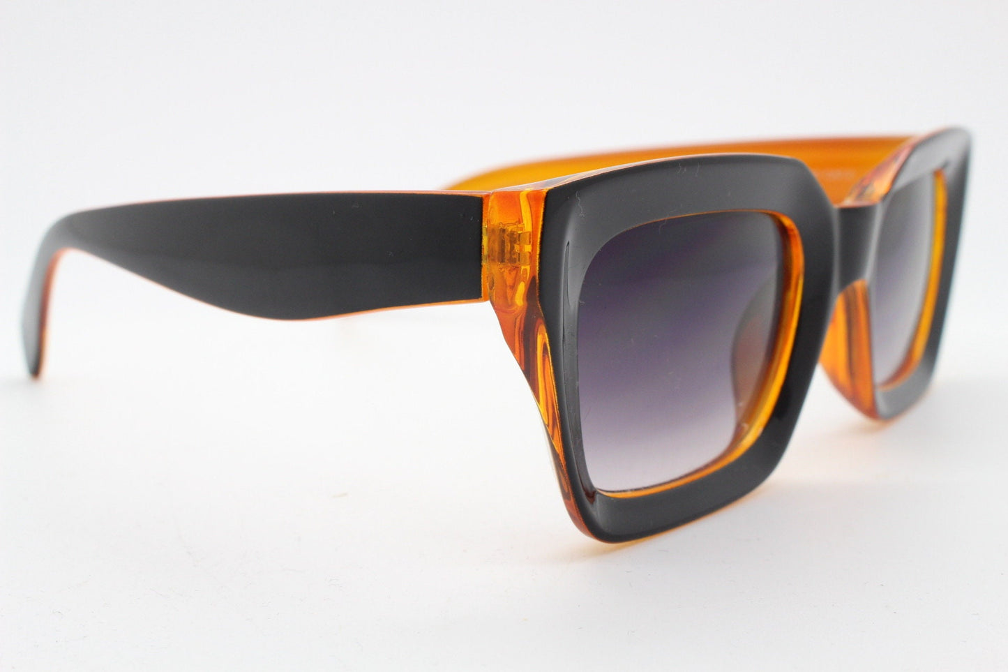 Y2K vintage rectangular cat eye sunglasses. Women's thick black and orange 60s style frame with graduating smoky lenses. 2000s BNWT