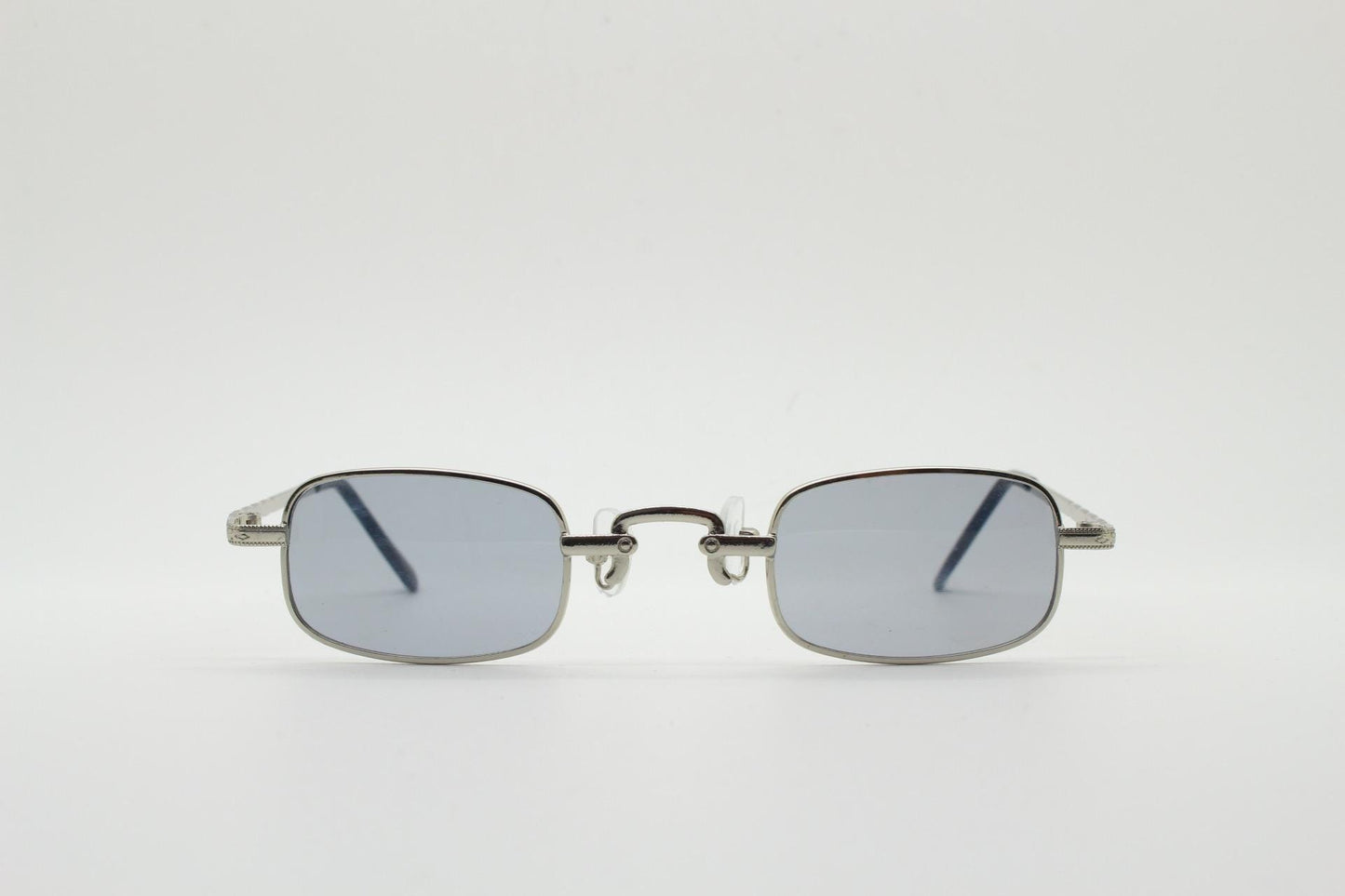 90s vintage small rectangular sunglasses. Imposing minimal silver victorian style frame with grey lenses. Steampunk. Unused NOS