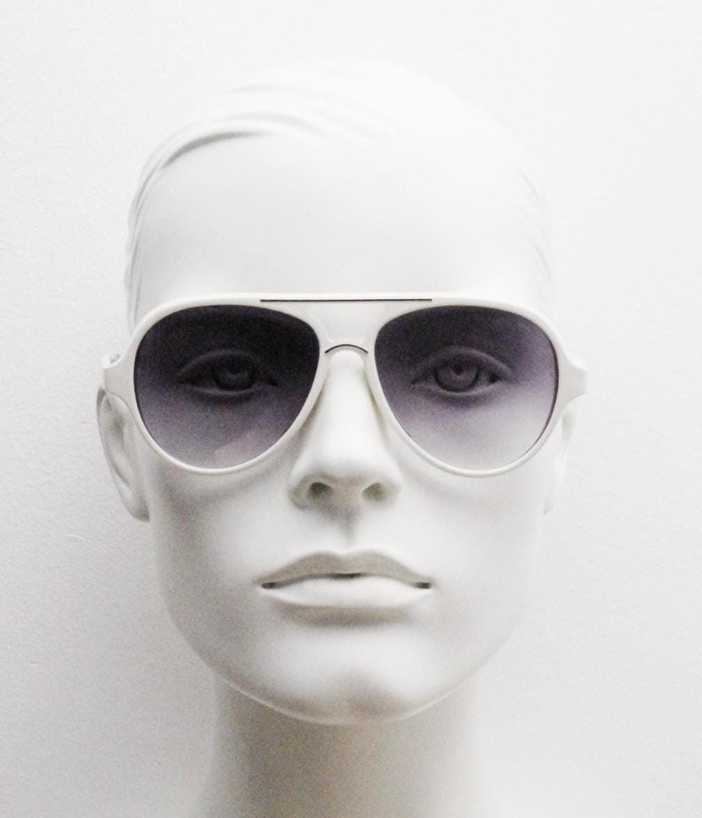 Y2K vintage teardrop aviator sunglasses. 2000's ice white frame with graduating black lenses and bridge outline. 80s design NOS aviators