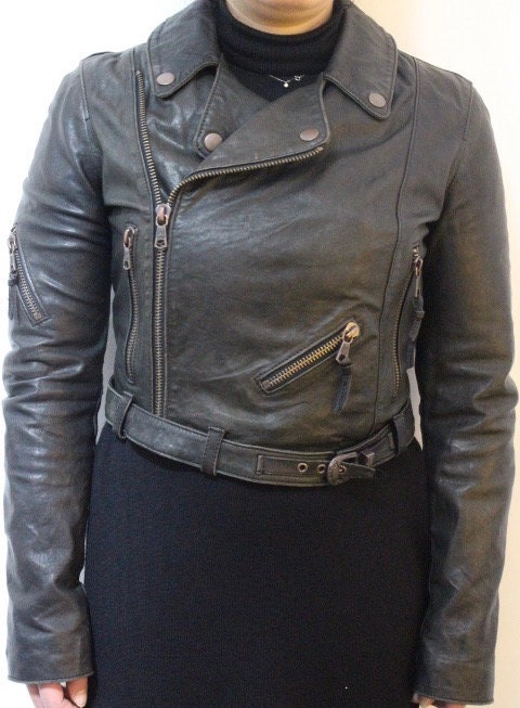 Diesel black fitted womens motorcycle jacket. Genuine leather cropped biker design with fixed adjustable belt. Over 30% sale rrp 469 GBP