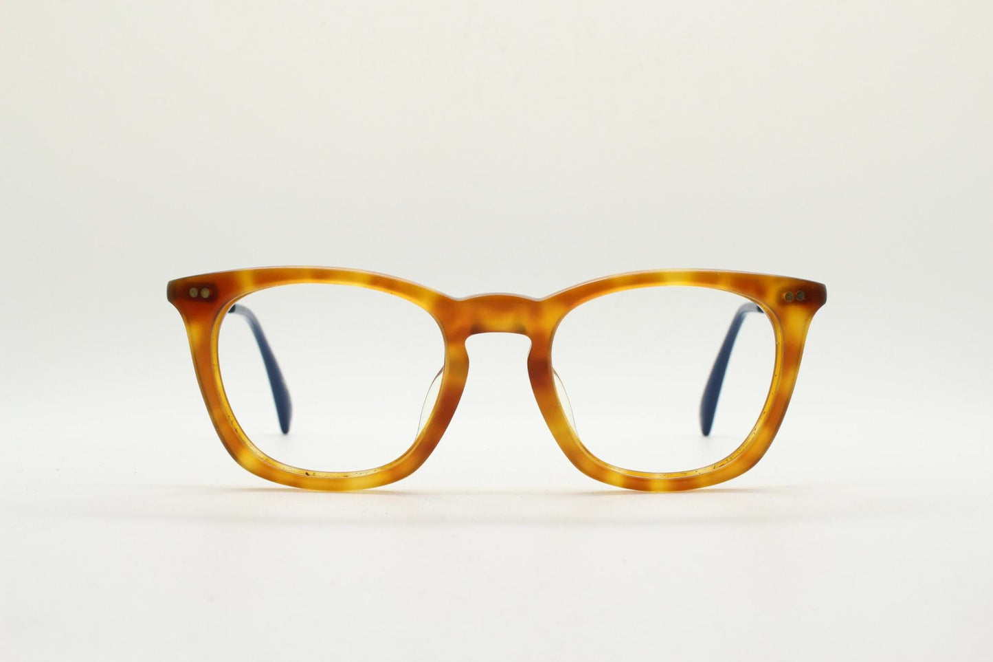 Tom's rectangular horn rim eye glasses. Classical 40s design in amber acetate with gold arms. Prescription optical frames. RX spectacles