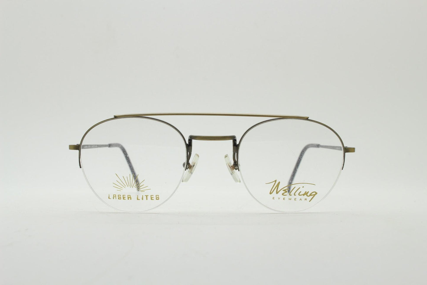90s vintage round eye glasses made in Japan by Welling. Brushed bronze finish optical half frame. Prescription RX spectacles. NOS