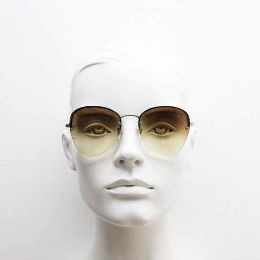 90s vintage modified teardrop aviator sunglasses. Minimal metal silver chrome half frame with compelling lenses. Teardrop aviators. NOS