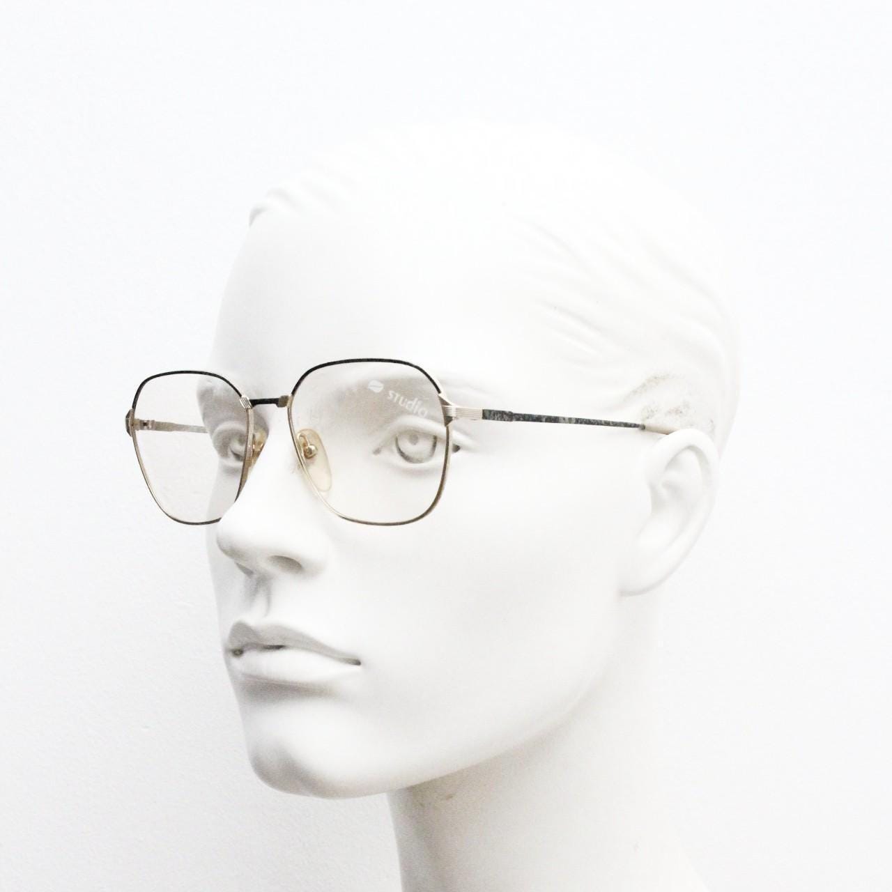 80s vintage square eye glasses made in Italy by Studio. Black and gold patterned metal optical frames in neat proportions. Unused NOS