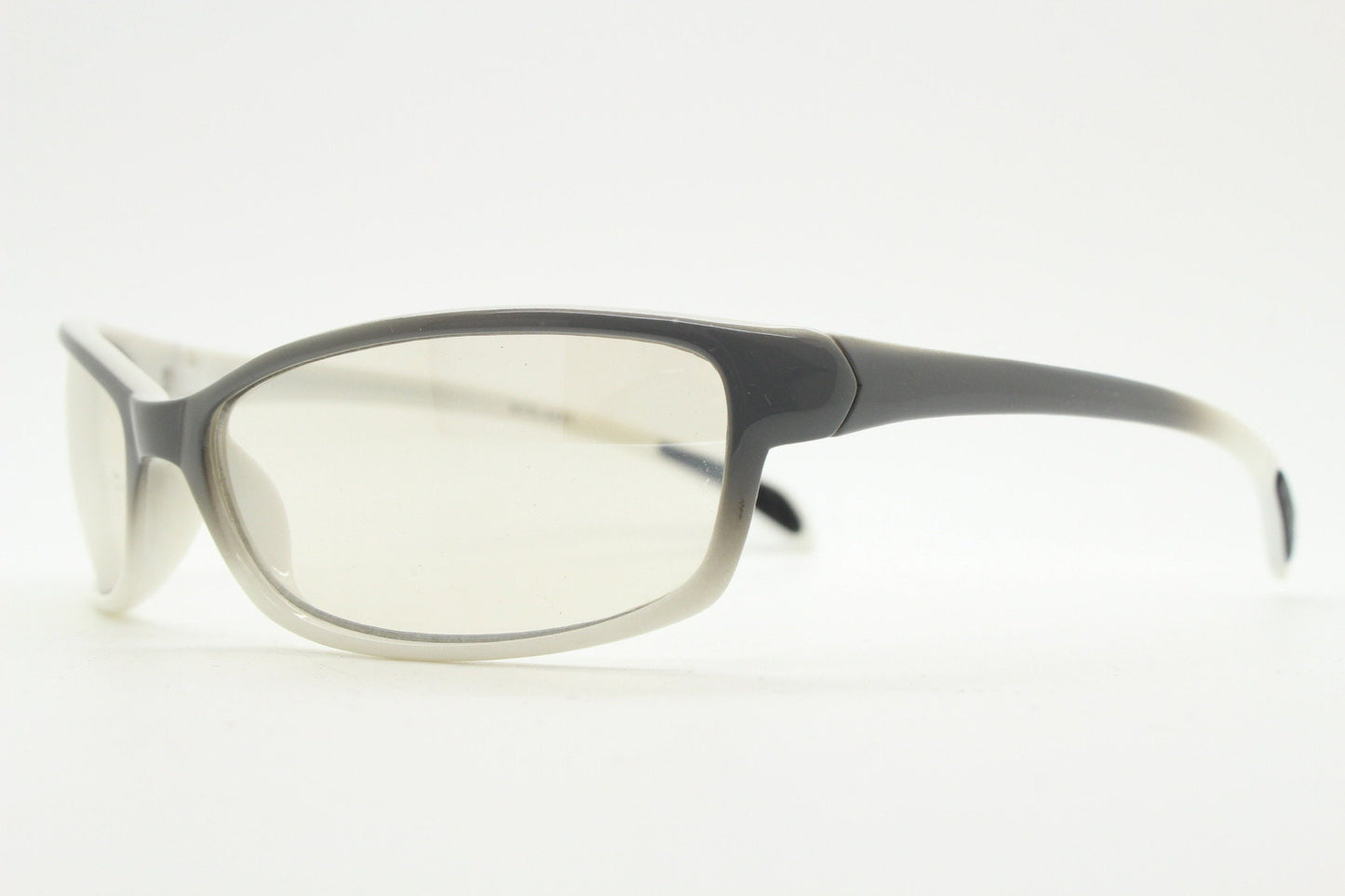 Y2K vintage futuristic sunglasses. Gloss white and grey wrap around shield style frame with light tone lenses. Cosplay visor. 2000s NOS