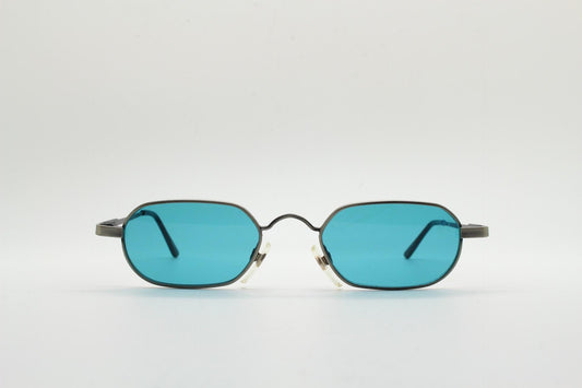 90s vintage small angular oval sunglasses by Blue Point. Low profile brushed bronze finish metal frame with turquoise blue lenses, NOS