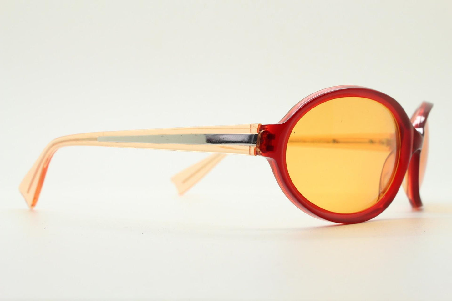 Alain Mikli Y2k vintage mini goggle sunglasses. Red transparent oval curved frame with blazing orange lenses. Definitive 2000s NOS