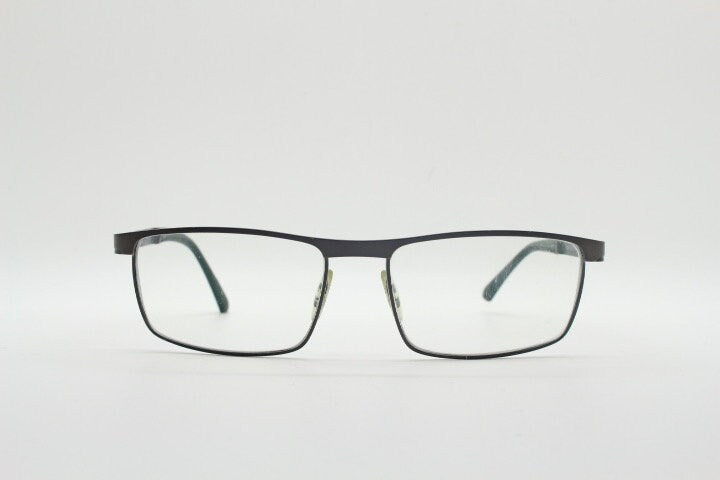 Porsche design rectangular eye glasses model 8251 made in Japan. Minimal gunmetal grey wire optical frame. Prescription RX spectacles