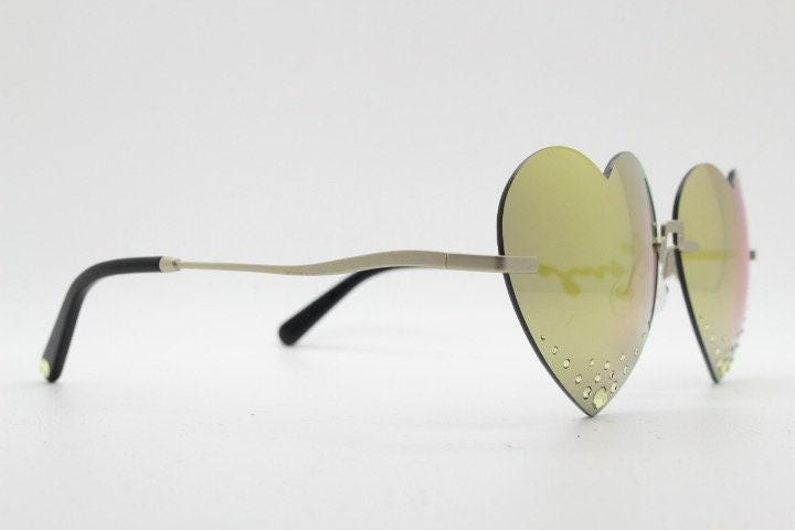 Kenzo mirror heart shaped frameless sunglasses model KZ40005U. Instant classic design with diamantes and big spell out arm logo. NOS