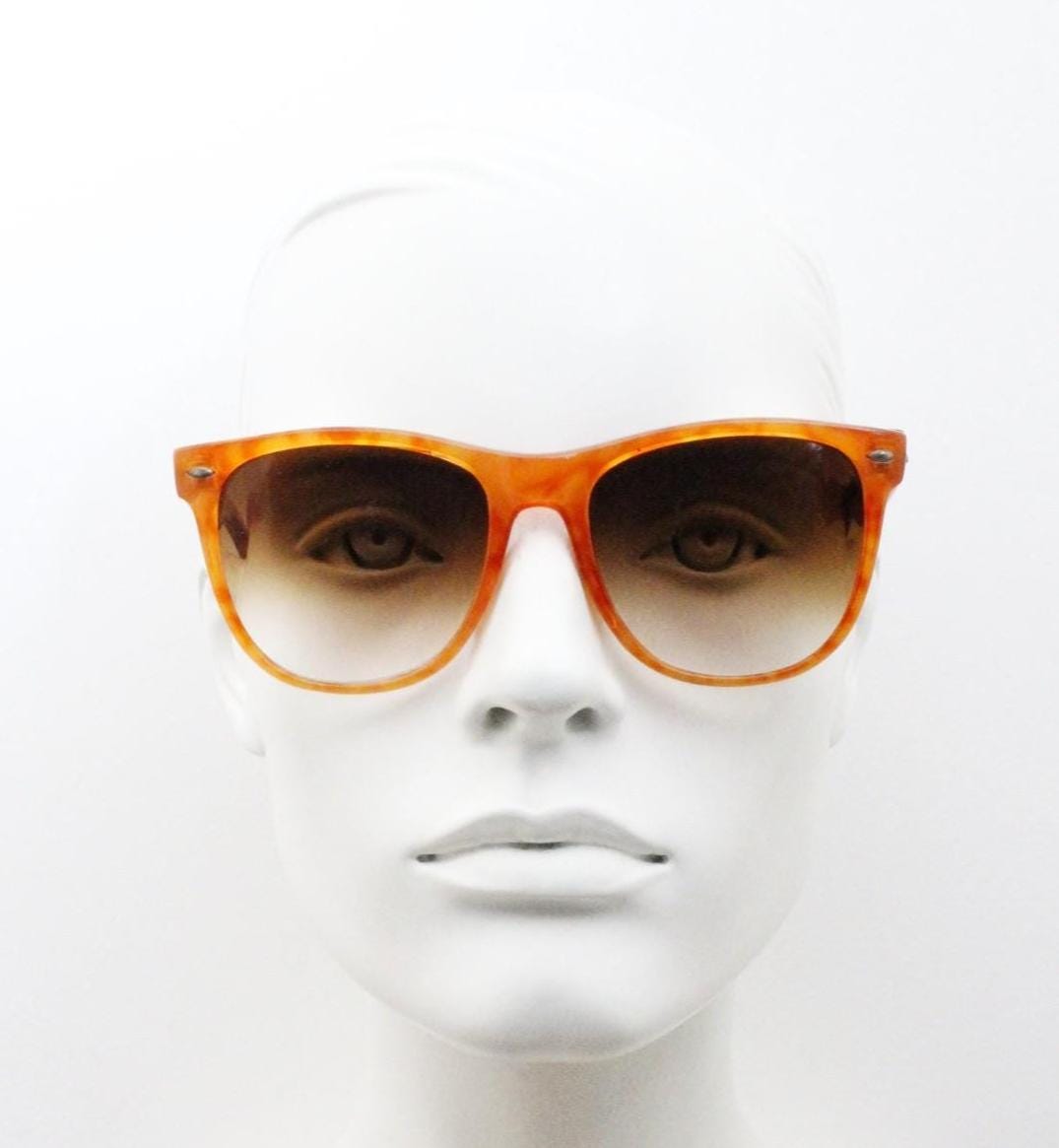 Vintage 80s square horn rim sunglasses. All time classic Wayfarer design in vibrant orange frame and superb graduating lenses