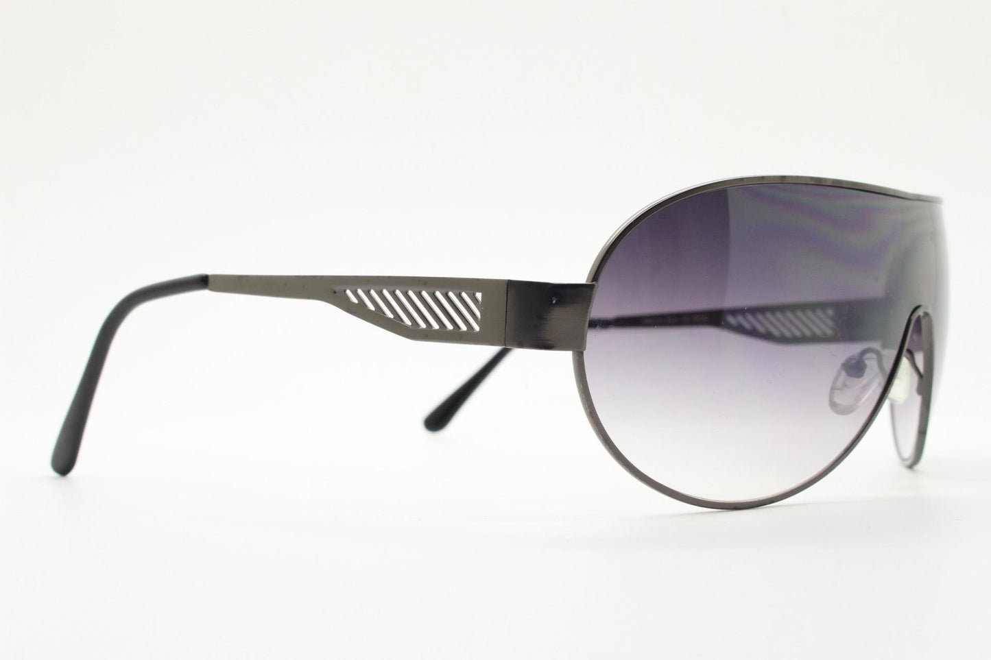 Y2K vintage large mask aviator sunglasses. Grey curved wrap around shield design with graduating monolens and cut out arm stripes. 2000s NOS