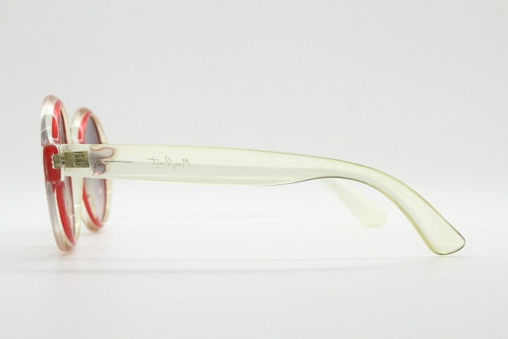 Mary Quant 60s vintage round sunglasses made in France. Yellow crystal transparent lucite frame in with contrasting dark graduating lenses
