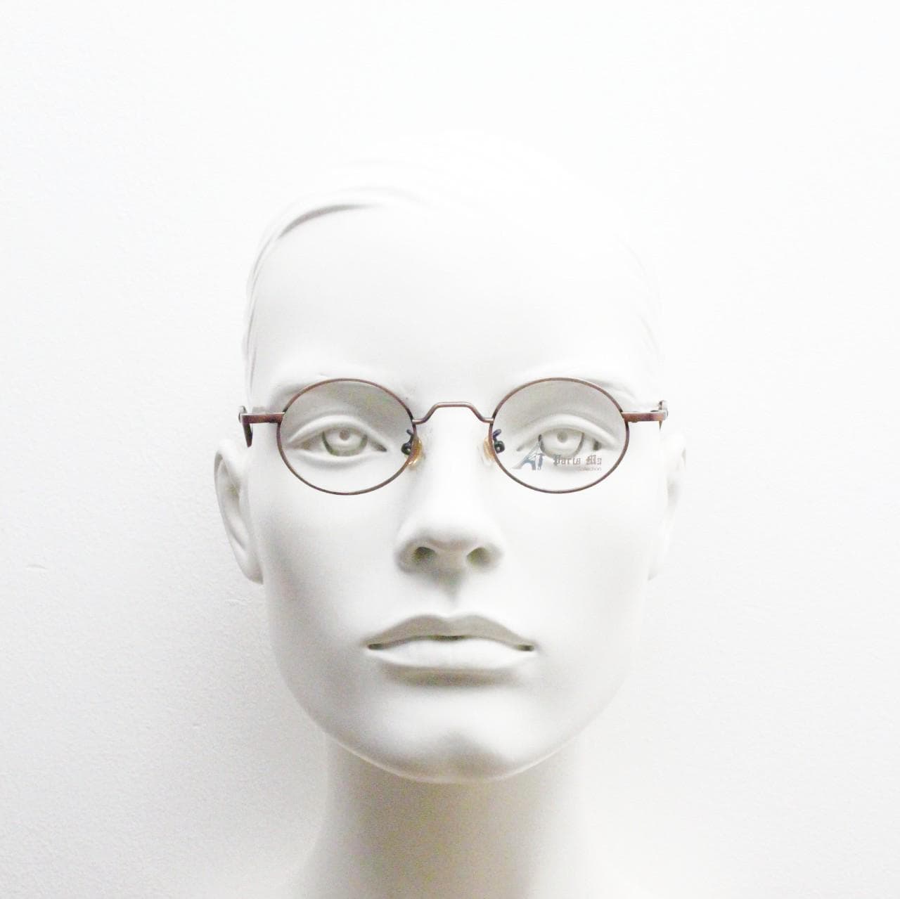 Paris Ma 90s vintage small oval eye glasses. Brushed bronze optical frames with scrolled arm details. Prescription. Steampunk spectacles NOS