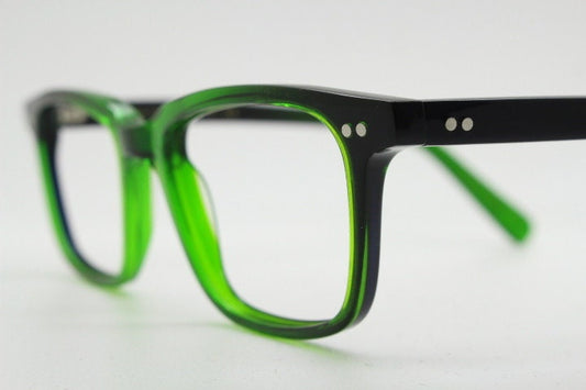 Green rectangular low profile wayfarer design eye glasses by found of Switzerland. Green gloss acetate optical frames. Prescription RX