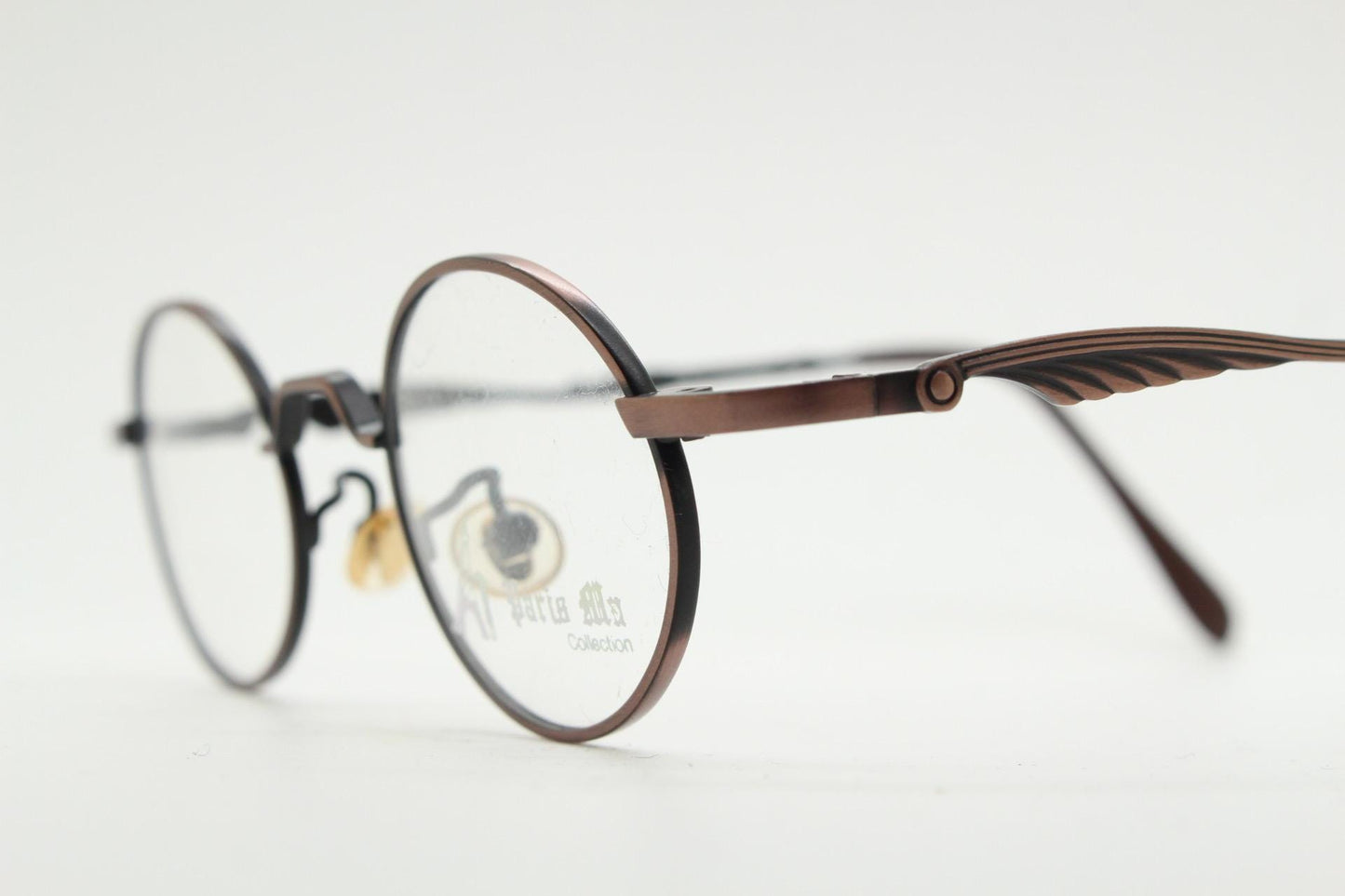 Paris Ma 90s vintage small oval eye glasses. Brushed bronze optical frames with scrolled arm details. Prescription. Steampunk spectacles NOS