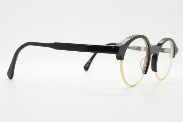 Kaleos round half frame eye glasses. Black gloss acetate browline optical frames with gold underwire. Prescription eyeglasses. RX