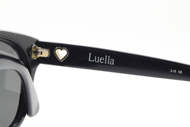 Linda Farrow Collaborations sunglasses with LUELLA. Limited production black acetate chunky wayfarer design with heart crests. NOS vintage