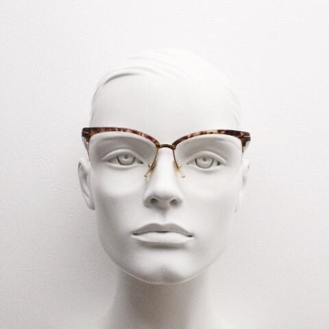 Versace 90s vintage brow line cat eye glasses made in Italy. Elegant tortoise acetate cateye optical half frames. Prescription RX eyeglasses