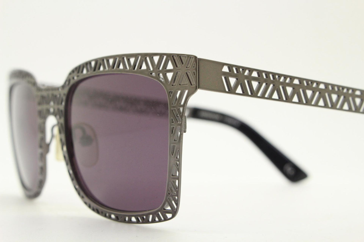 Sass and bide vintage wayfarer shape sunglasses. Gunmetal grey flat metal frame with cut out patterns throughout and black lenses. 2000s NOS