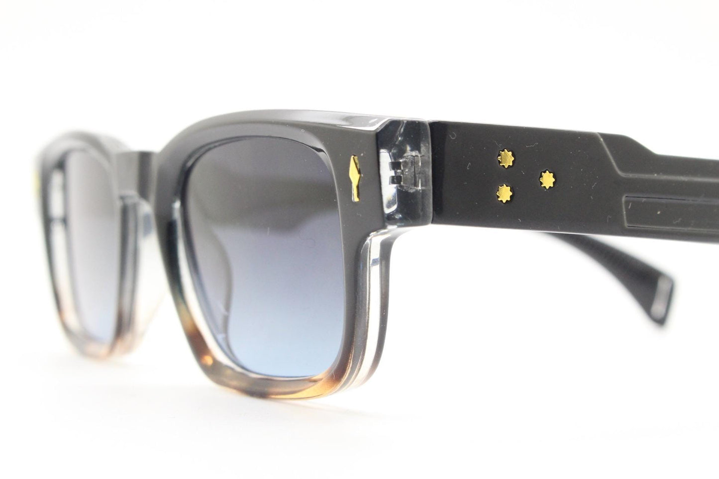 Vintage 90s low profile thick frame sunglasses. Black and tortoise ombre frame with graduating grey lenses. Unused NOS. One off sample