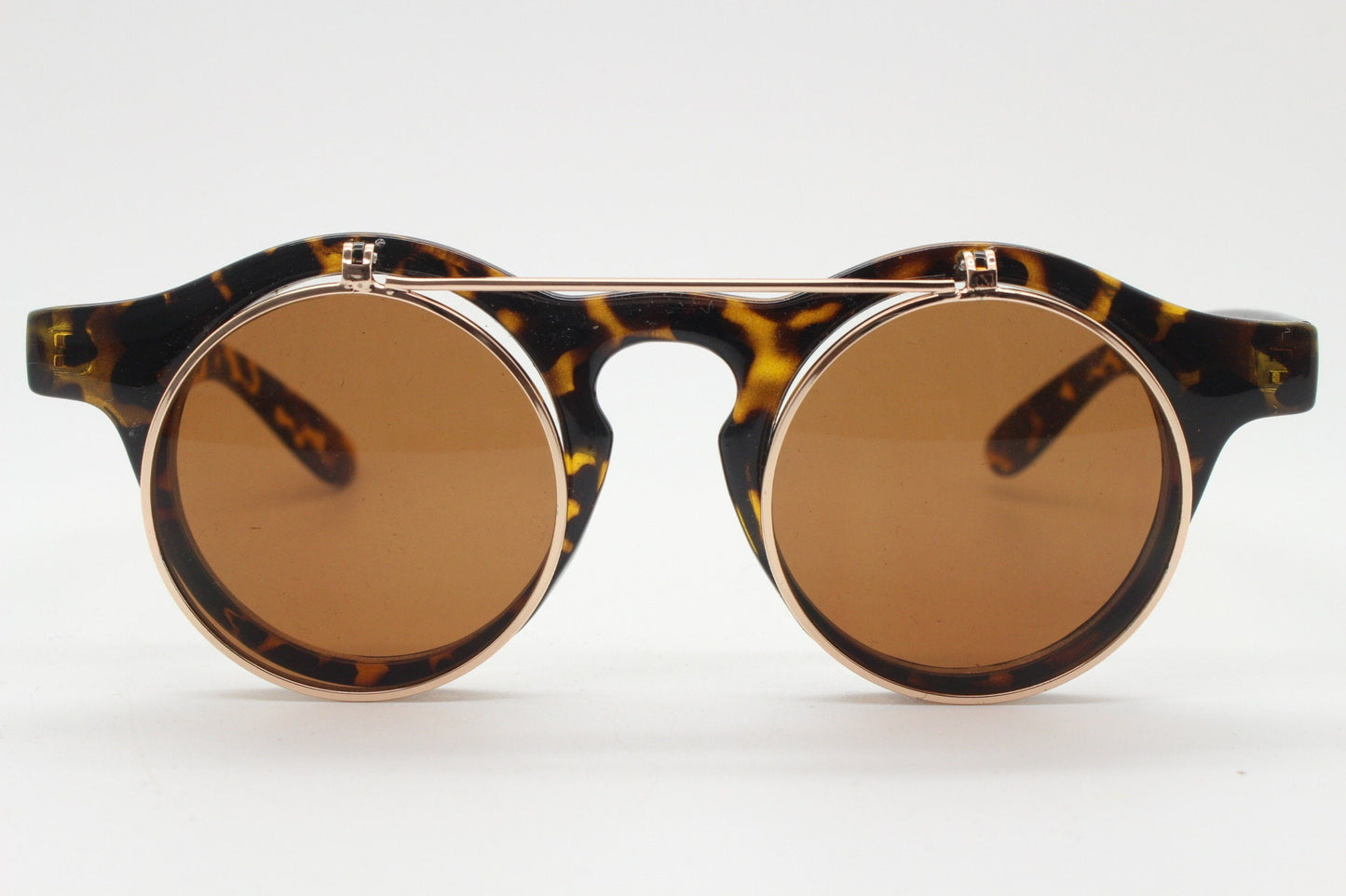 Vintage 90s round flipper sunglasses. 30s style tortoise frame with clear lenses and flip up sunglasses visor. BNWT unused