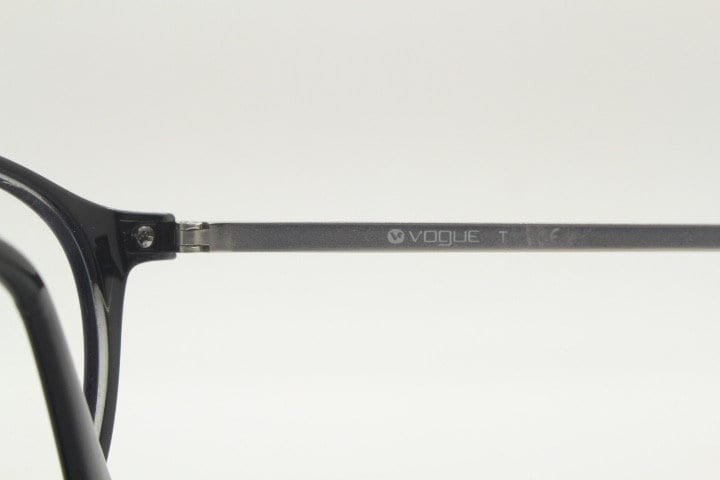 Vogue womens oval eye glasses model 5223. Black acetate optical frames with metal arms. Prescription eyeglasses. RX spectacles