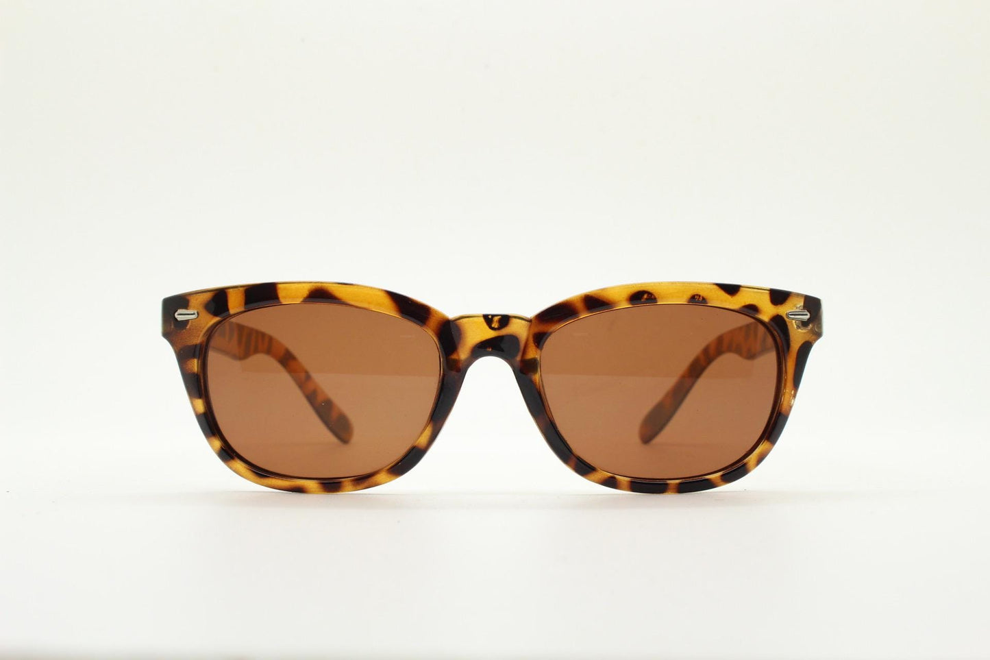 Vintage 90s modified wayfarer design sunglasses. Vibrant honey tortoise low profile frame with Havana brown lenses. Unused NOS