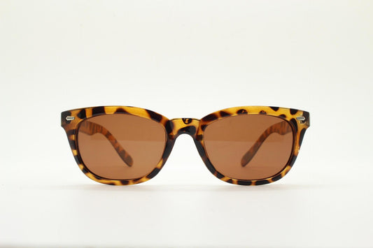 Vintage 90s modified wayfarer design sunglasses. Vibrant honey tortoise low profile frame with Havana brown lenses. Unused NOS