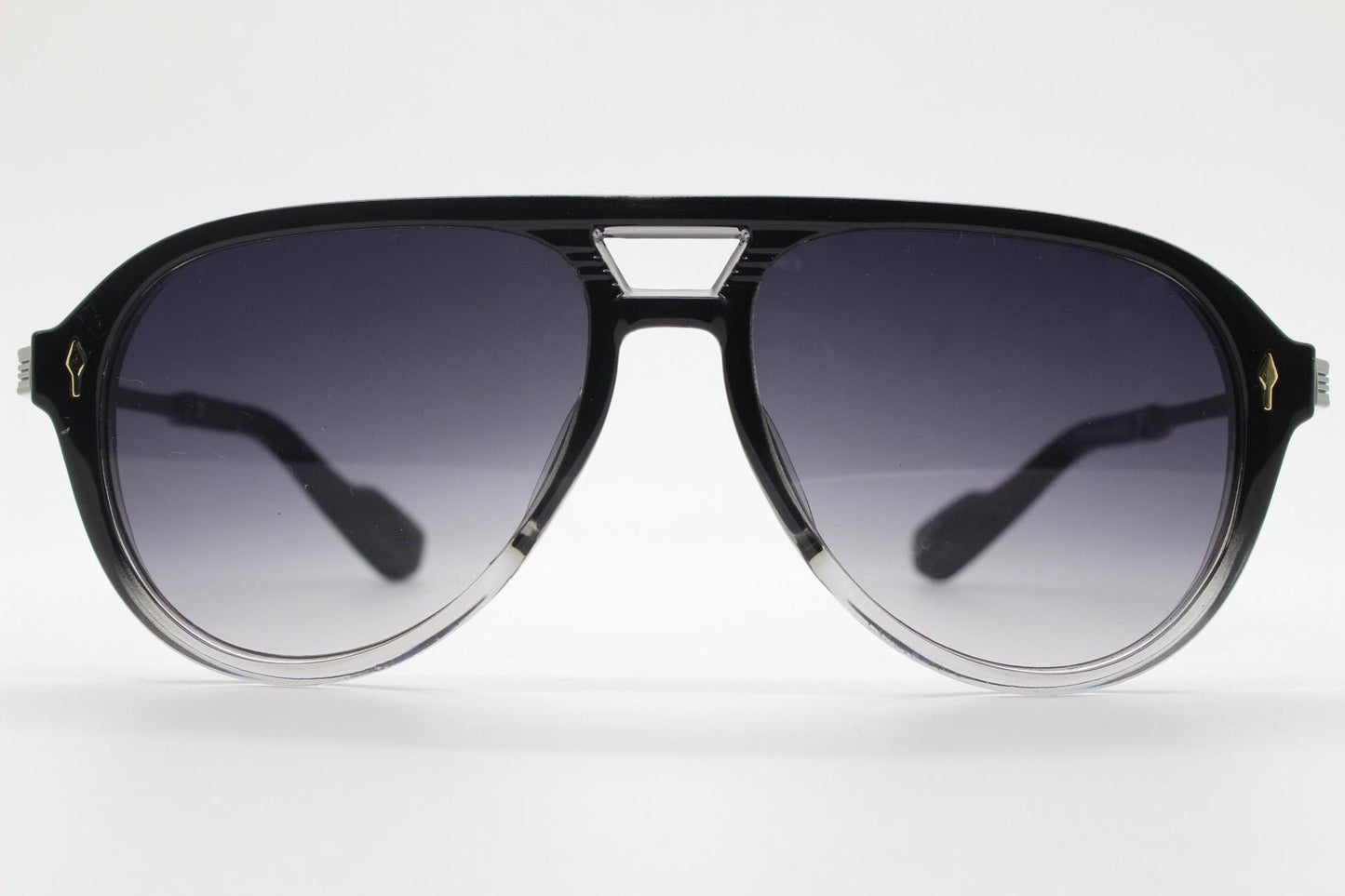 Y2K vintage transparent black aviator sunglasses. Well proportioned teardrop shape with graduating lenses and grey metal embossed arms. NOS