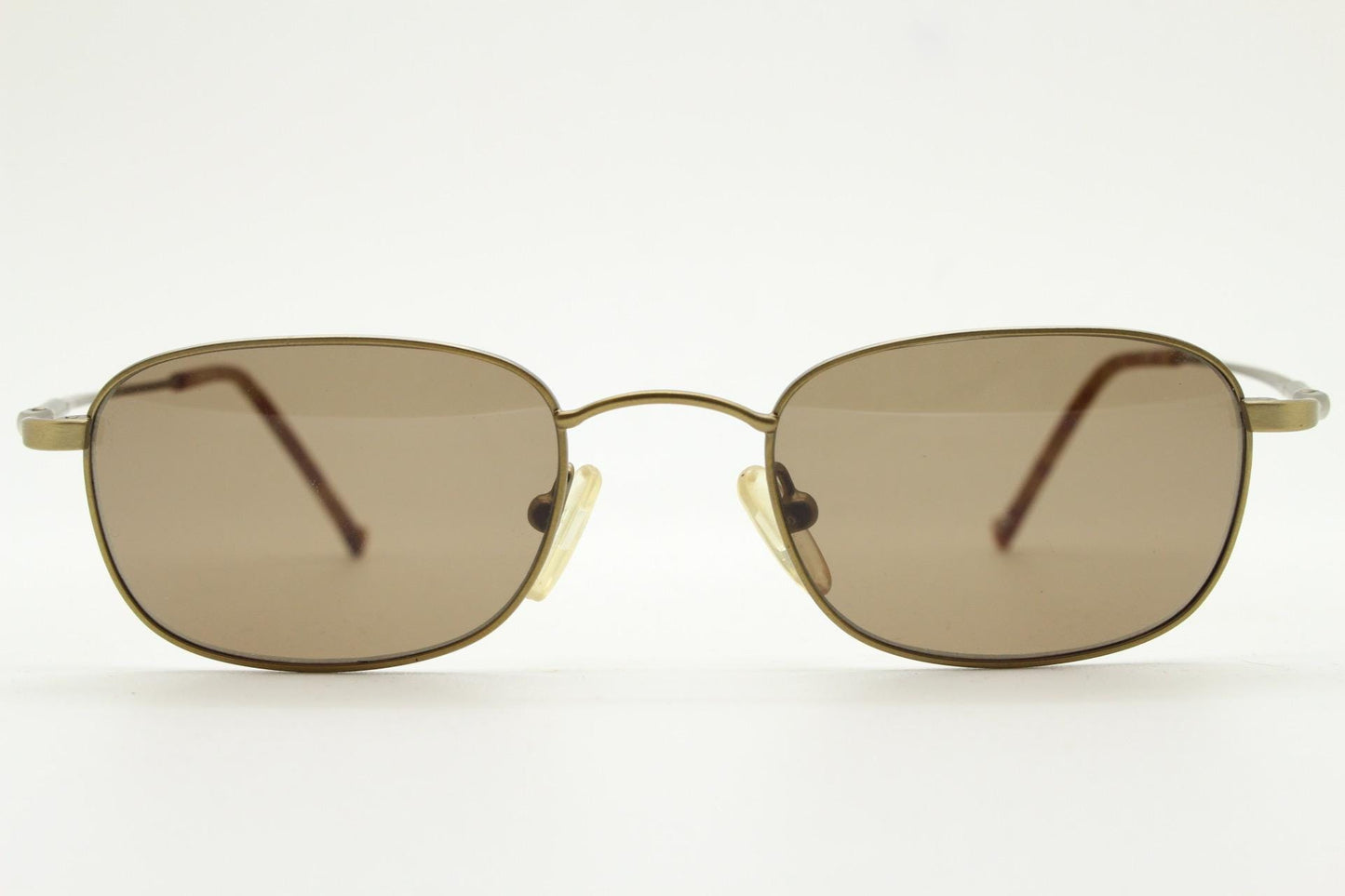 90s vintage small rectangular low profile metal sunglasses. Minimal slim frame in satin bronze finish with plain brown lenses. NOS. BNWT