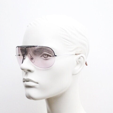 Y2K vintage visor shield sunglasses. Silver chrome half frame with pink wraparound mono lens and mirror glaze. Mini mask. 00's. 2000's NOS