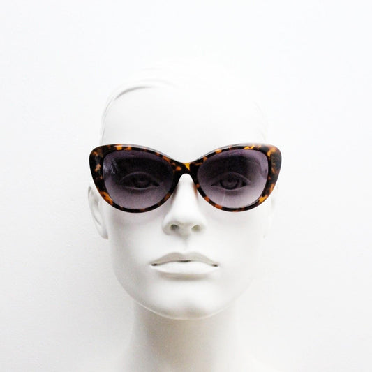 Vintage Y2K oval cat eye sunglasses. 2000s womens tortoise cateye with black graduating lenses. Rockabilly pin up. NOS catseye