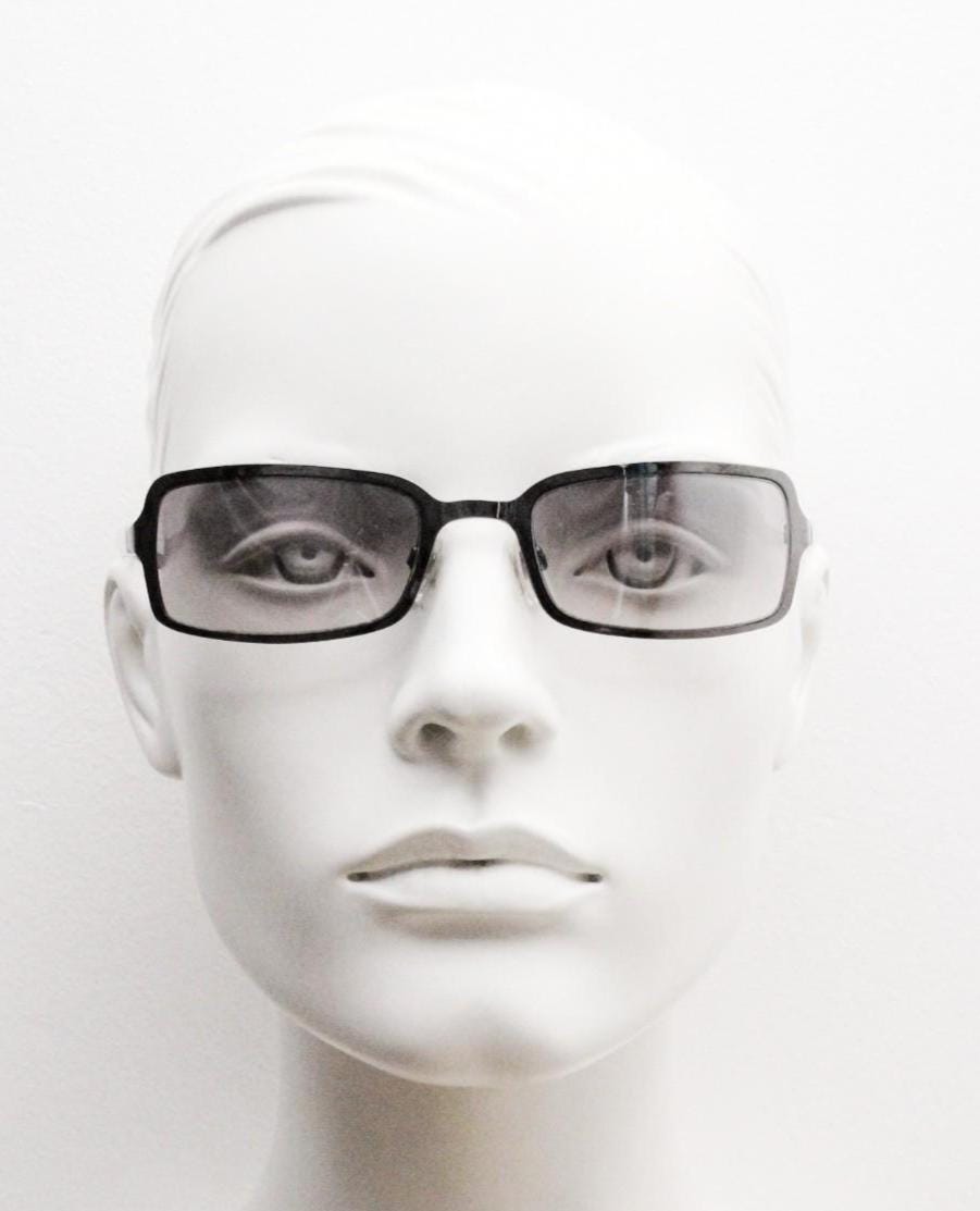 Y2K vintage rectangular sunglasses. Low profile mini shield frame in gunmetal chrome with light tone graduated mirror lens. 2000's. 90s. NOS