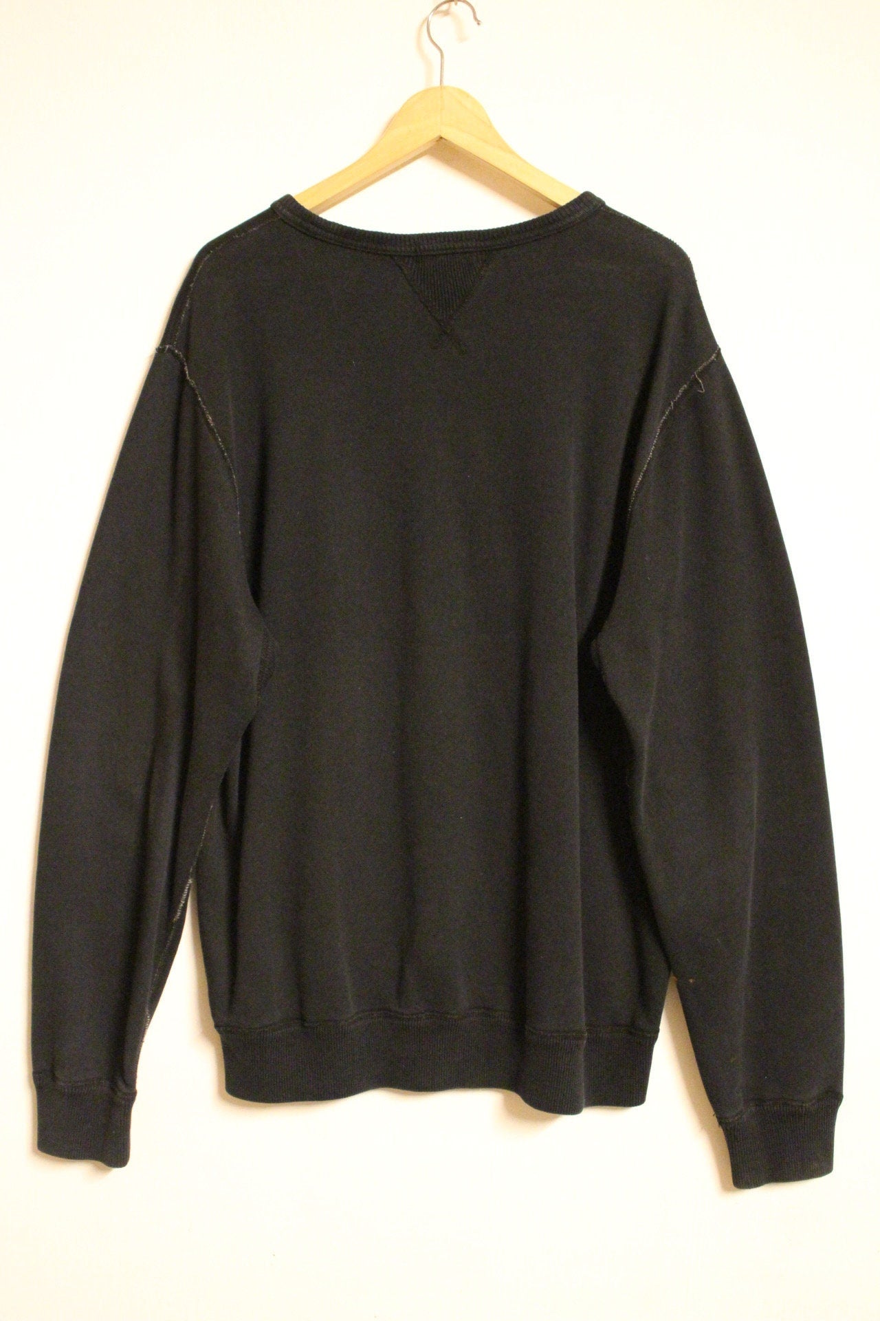 Ralph Lauren Polo Jeans Co. vintage sweatshirt. Black crew neck pullover with distressed US flag patch. Round neck jumper