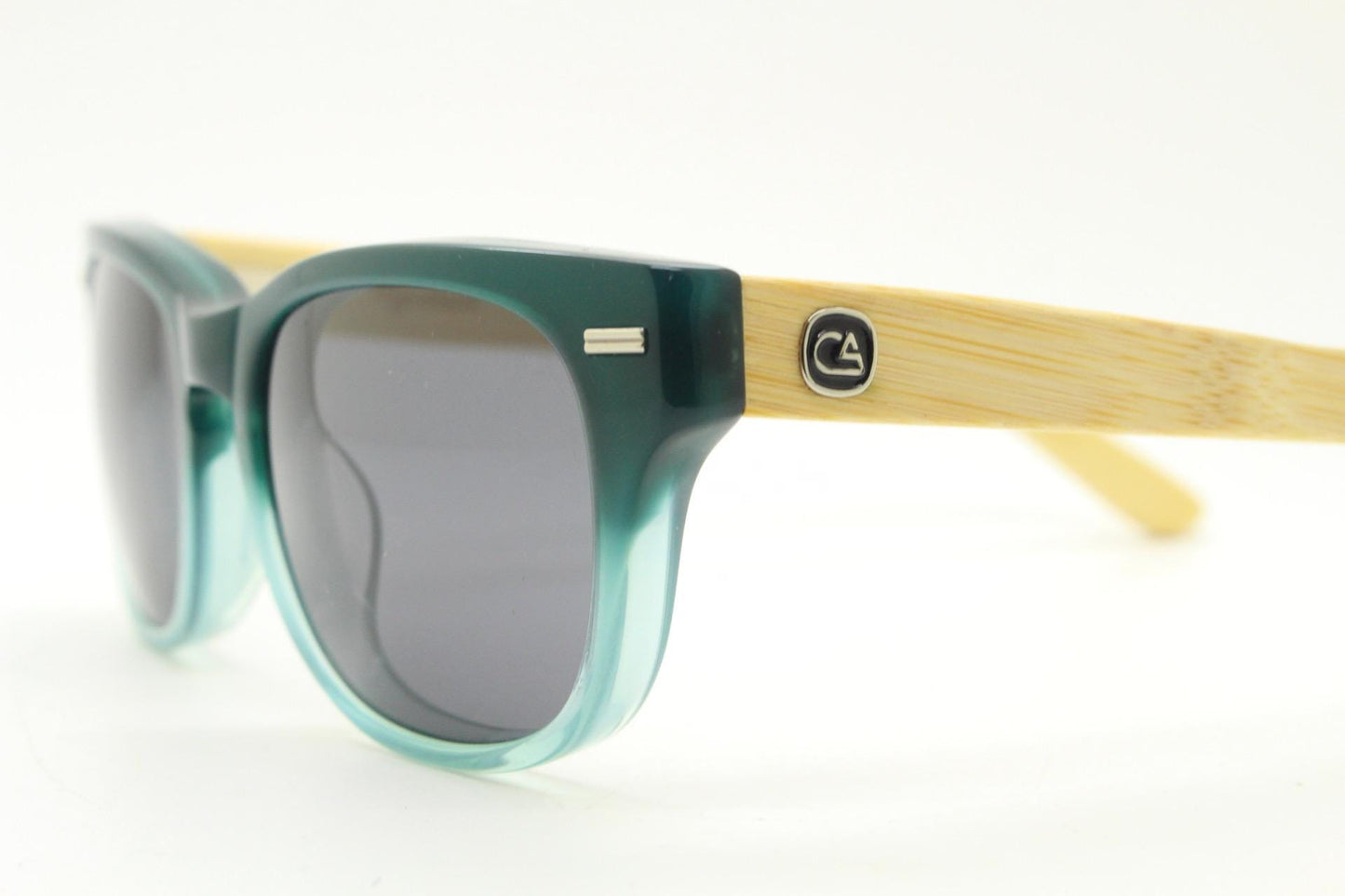 Calisons ryder modified wayfarer design sunglasses. Thickened blue acetate front with natural real wooden arms. Unused NOS