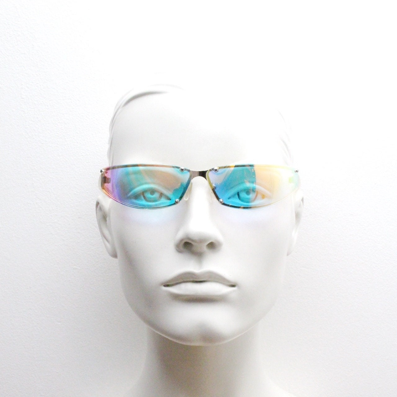 Y2K vintage wraparound sunglasses. Minimal chrome frame with light tone curved gold colour burst mirror lenses. 2000's. 90s. NOS